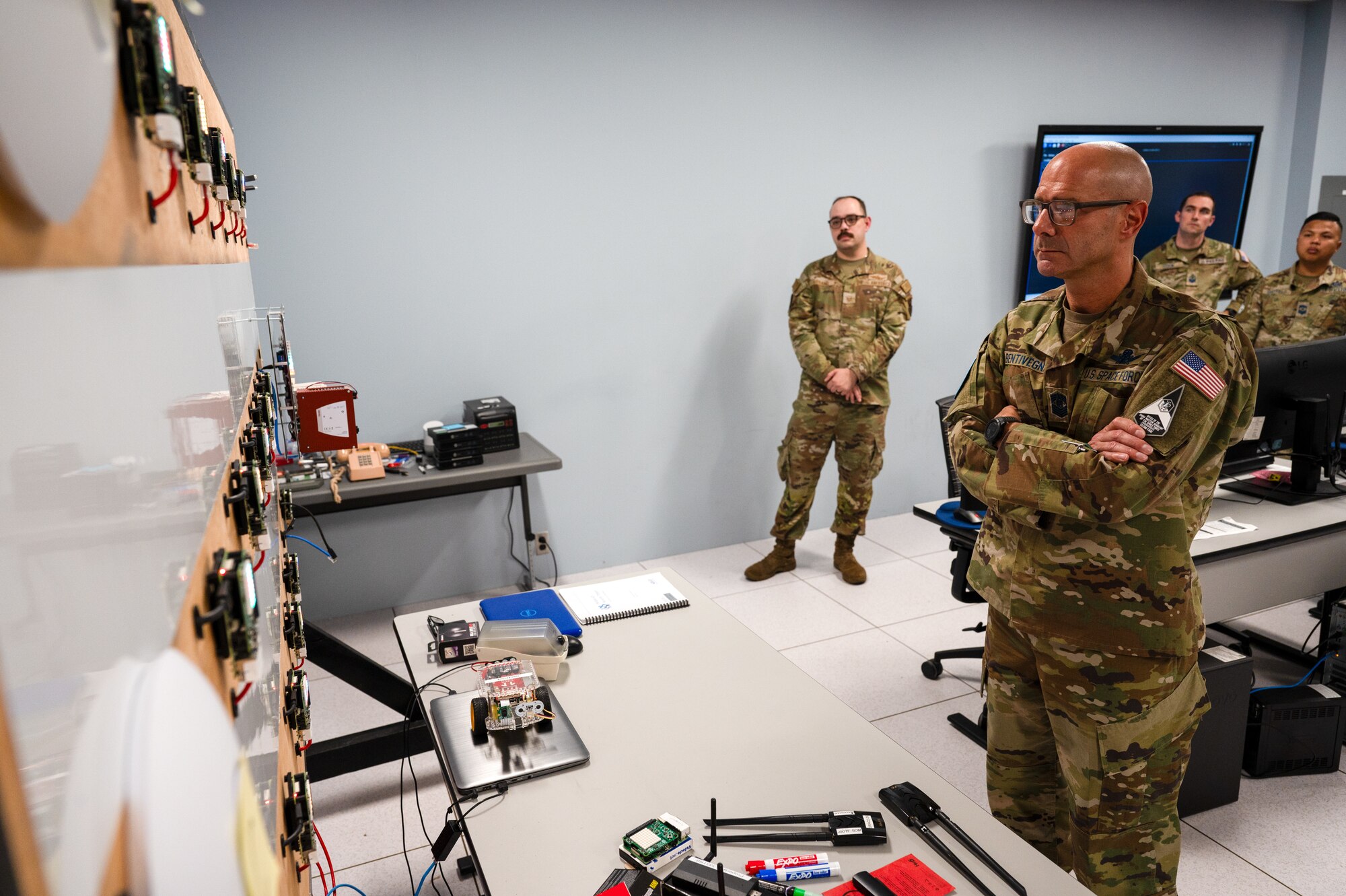 Chief Master Sergeant of the Space Force John F. Bentivegna observes the 333rd Training Squadron's tunneling lab at Keesler Air Force Base, Mississippi, Aug. 9, 2024.
