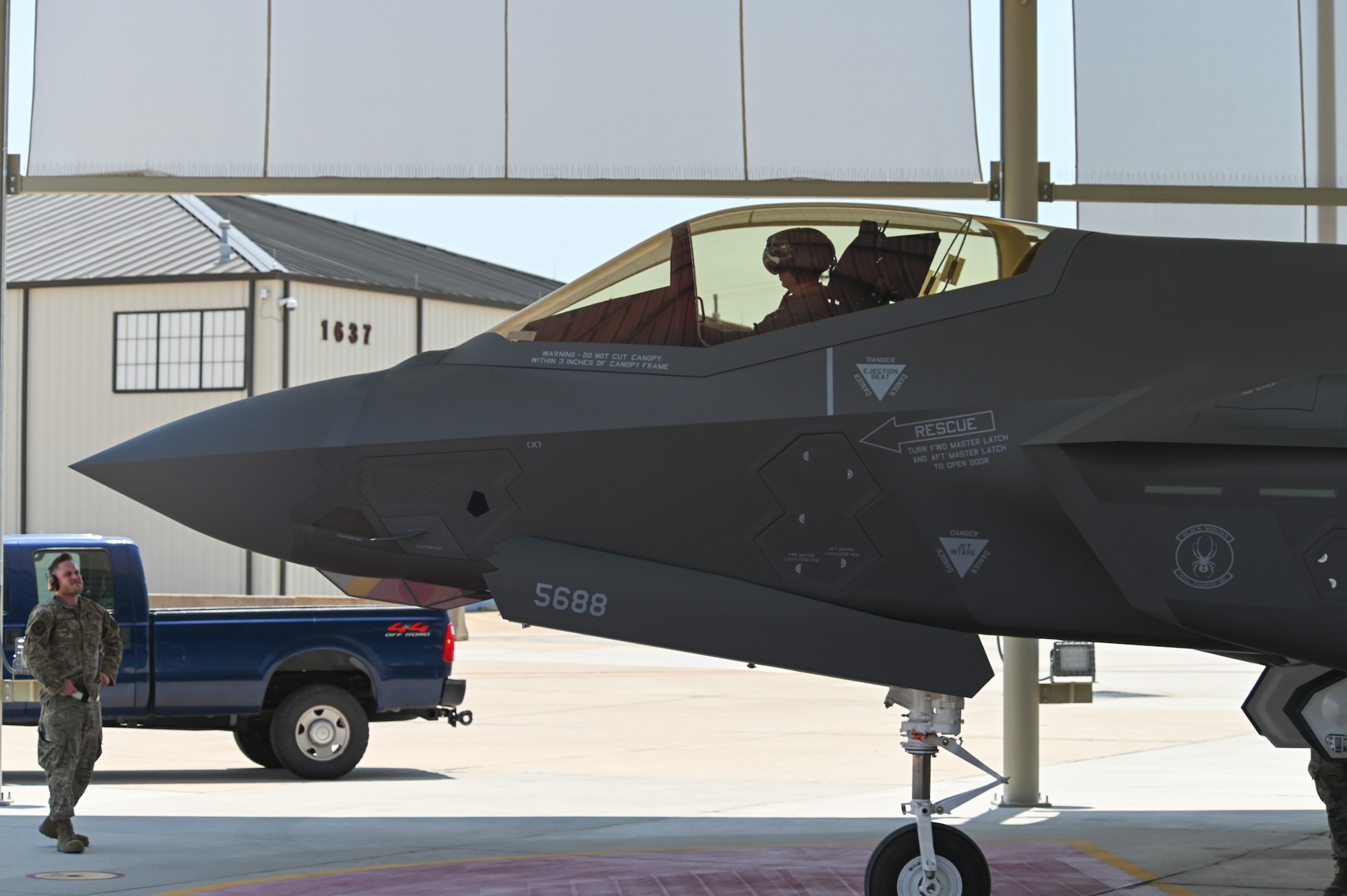 An F-35A Lightning II from Hill Air Force Base, Utah arrives under a canopy at Naval Air Station Joint Reserve Base Fort Worth, Texas, Aug. 8, 2024.