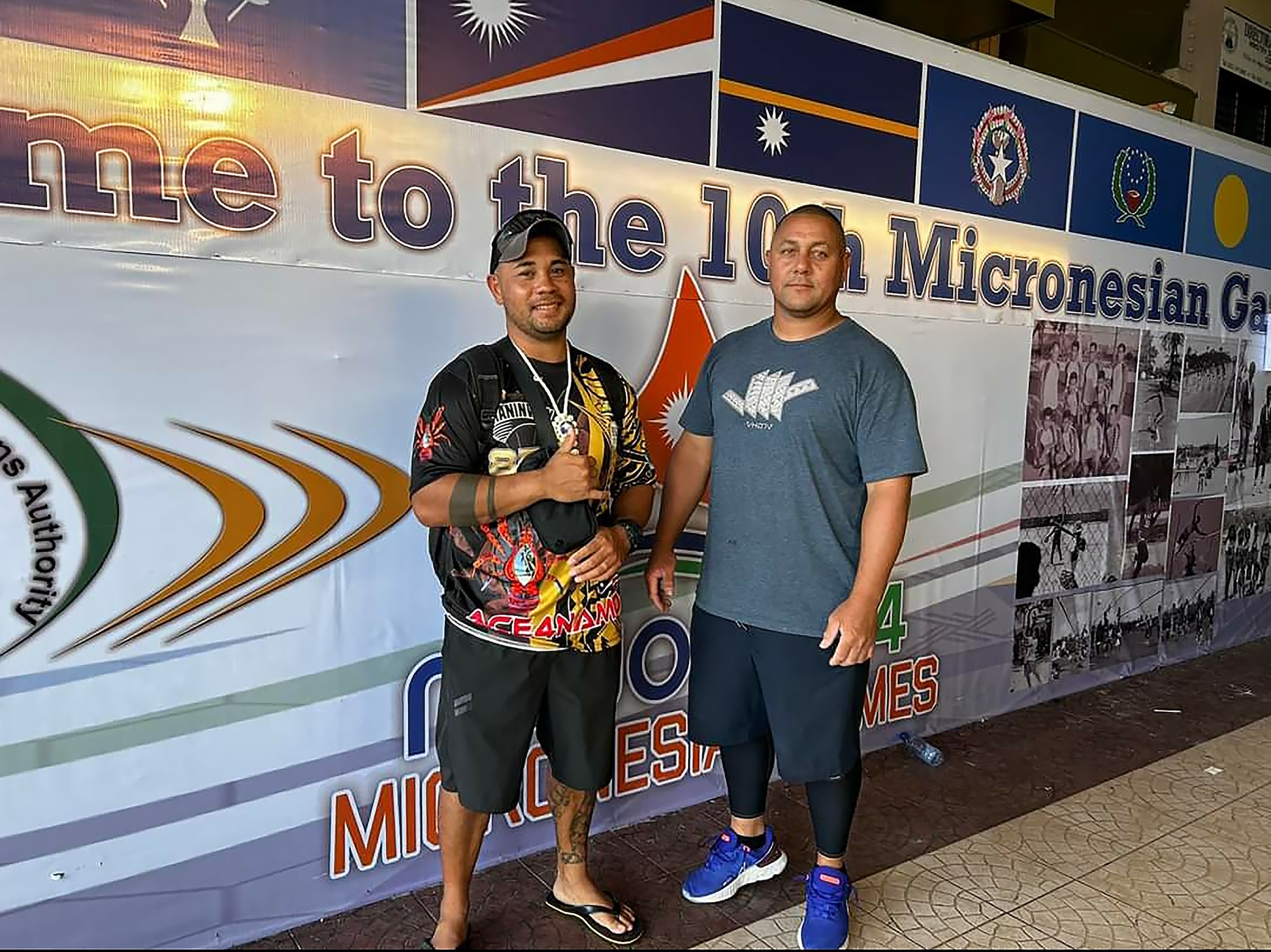 U.S. Army Staff Sgt. Derek Milne (right) and First Sgt. David Milne (Left), pose for a photo.