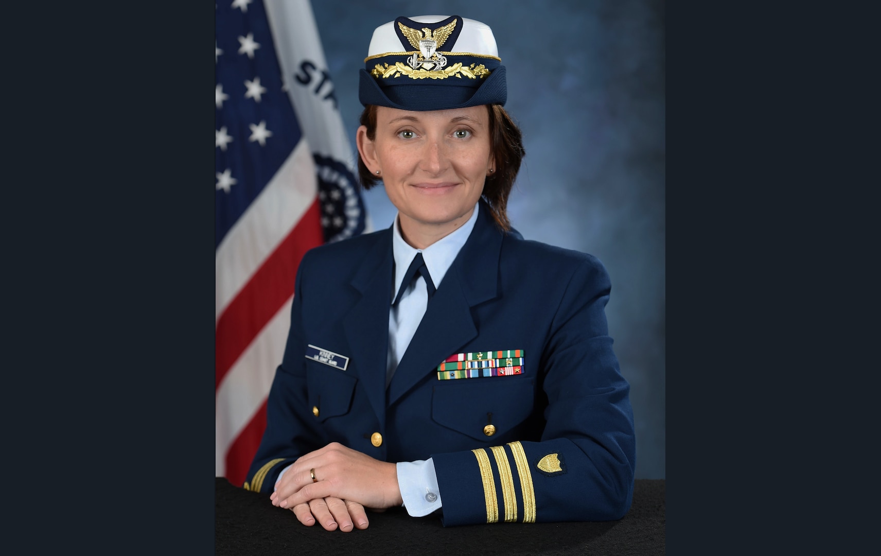 Portrait photo of Cmdr. Gretal Kinney, Federally Employed Women Military Meritorious Service Award recipient. (U.S. Coast Guard photo)