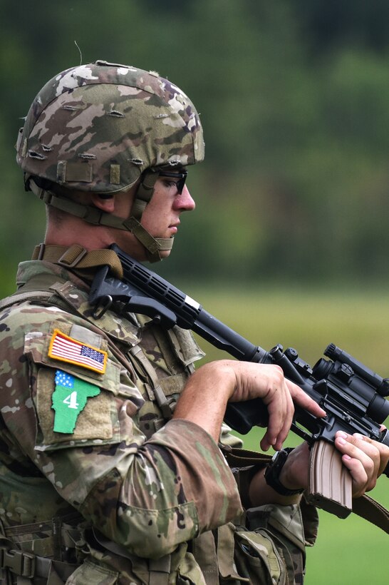 Spc. Tevin Kenton, representing the Wisconsin Army National Guard, takes part in a stress shoot Aug. 5 during the Army National Guard’s 2024 Best Warrior Competition at the Ethan Allen Firing Range near Jericho, Vt. Over five days of competition, 14 of the nation’s top Army National Guard Soldiers and NCOs will face a series of rigorous challenges, including multiple ruck marches, weapons proficiency tests, a written exam and an appearance board. The top competitors will go on to represent the Army National Guard in the Department of the Army Best Squad Competition. U.S. Army National Guard photo by Sgt. 1st Class Terra C. Gatti