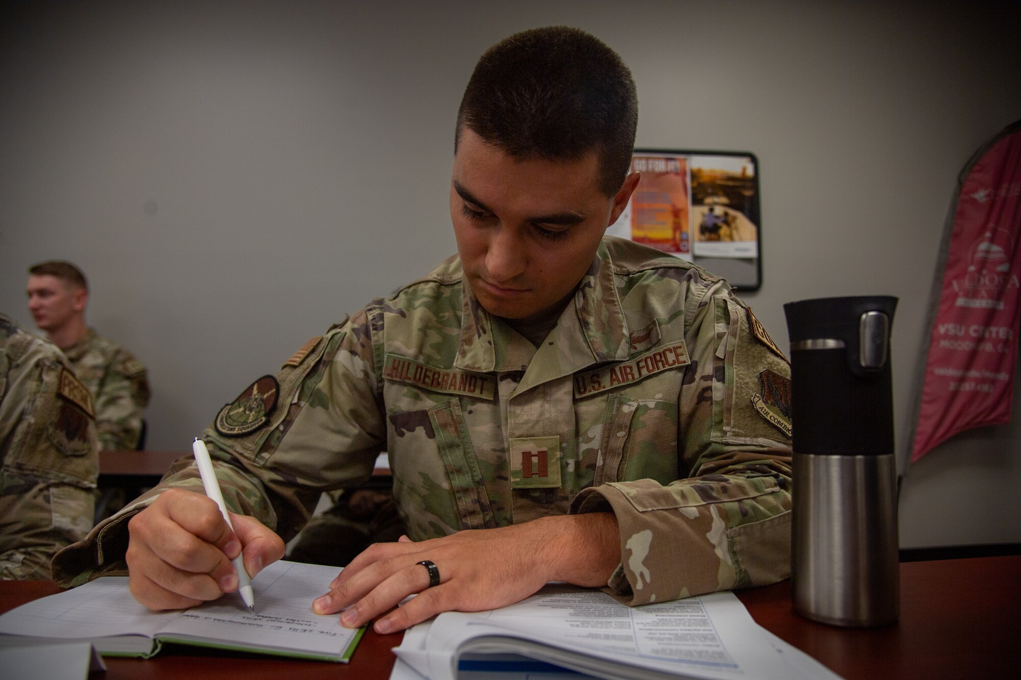 U.S. Air Force Capt. Michael Hildebrandt, 23rd Civil Engineer Squadron flight commander, takes notes during a flight commander course at Moody Air Force Base, Georgia, Aug. 1, 2024. The course was designed to build, refine and develop company grade officers’ ability to lead Airmen. (U.S. Air Force photo by Airman 1st Class Cade Ellis)
