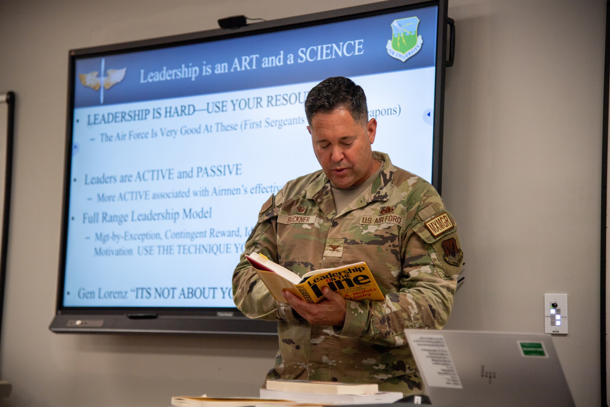U.S. Air Force Col. Bobby Buckner, 23rd Maintenance Group commander, shares an excerpt from a leadership book during a flight commander course at Moody Air Force Base, Georgia, Aug. 1, 2024. Buckner, who is the senior leader for all flightline maintenance, provided his unique insight to the class on how to encourage his Airmen. (U.S. Air Force photo by Airman 1st Class Cade Ellis)