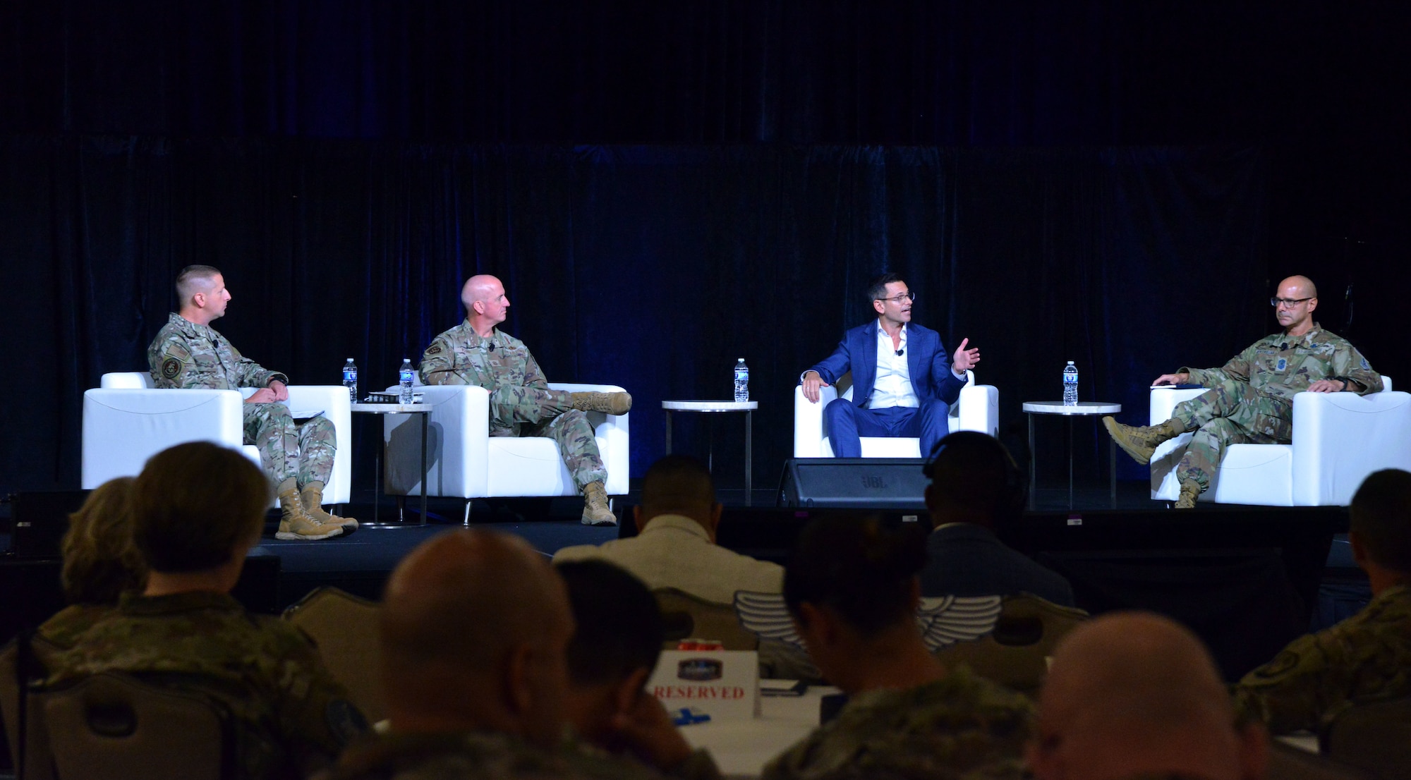 Alex Wagner, the Assistant Secretary of the Air Force for Manpower and Reserve Affairs, Chief Master Sgt. of the Air Force David Flosi and Chief Master Sgt. of the Space Force John Bentivegna speak at the Air Force Sergeants Association in Houston, Texas, Aug.13, 2024. Senior enlisted leaders gathered at the AFSA Summit to strategize, enhance innovation, and advance development for the Department of the Air Force. (U.S. Air Force photo by 2nd Lt. Faith Powers)