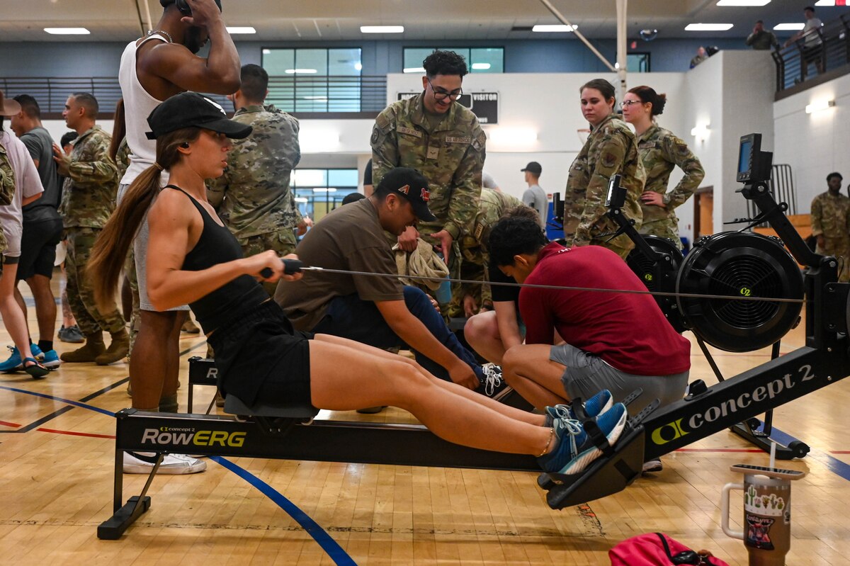 Coco Arn, military spouse, pushes off during the rowing event at Davis-Monthan Air Force Base, Ariz., Aug. 14, 2024. The base olympics was open to civilians and military members on the installation. (U.S. Air Force photo by Senior Airman Andrew Garavito)
