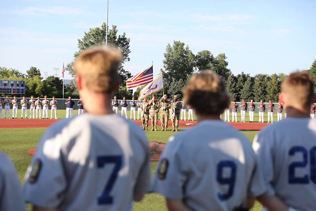 Soldiers from the 85th U.S. Army Reserve Support Command present the Nation’s Colors during the playing of the National Anthem, August 7, 2024, at the American Legion Post 76-hosted state champion baseball tournament for the Great Lakes region.