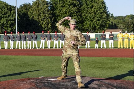 Brig. Gen. Michael Shanley, Commanding General, 85th U.S. Army Reserve Support Command, delivers a ceremonial first pitch to open the American Legion Great Lakes Regional Baseball tournament, August 7, 2024.