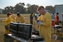 Airman 1st Class Ruban Ortiz from the emergency management support team sets up a radiation survey meter during exercise Bayou Guarantee at Barksdale Air Force Base, La., August 14, 2024. Radiation survey meters allow operators to check for radioactive contamination and ambient radiation in the environment, personnel and equipment. (U.S. Air Force Photo by Senior Airman Seth Watson)