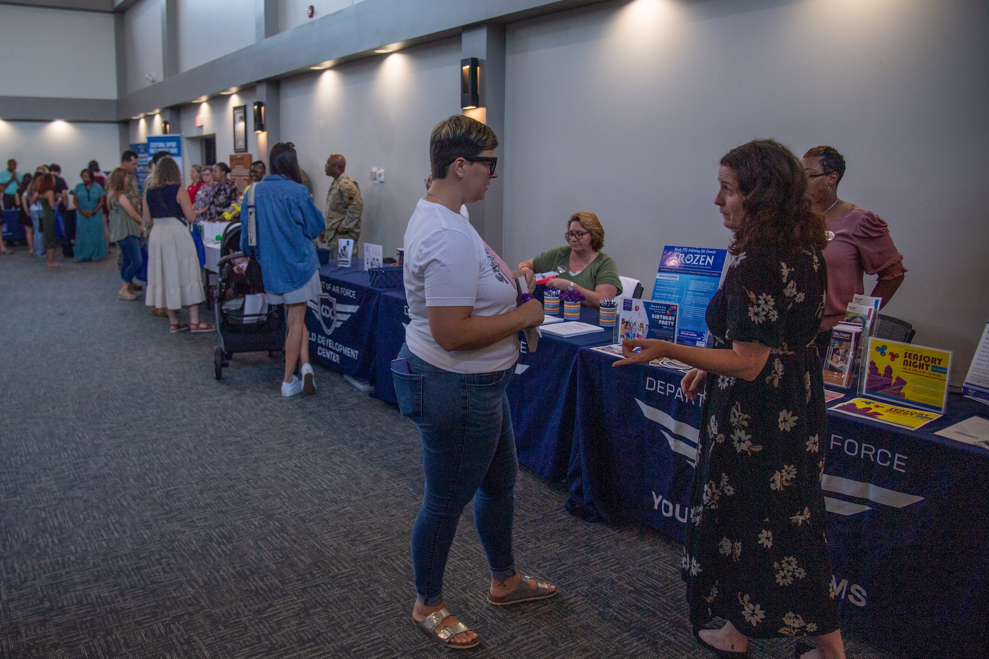 Airmen and their loved ones at the Pre-Deployment Symposium