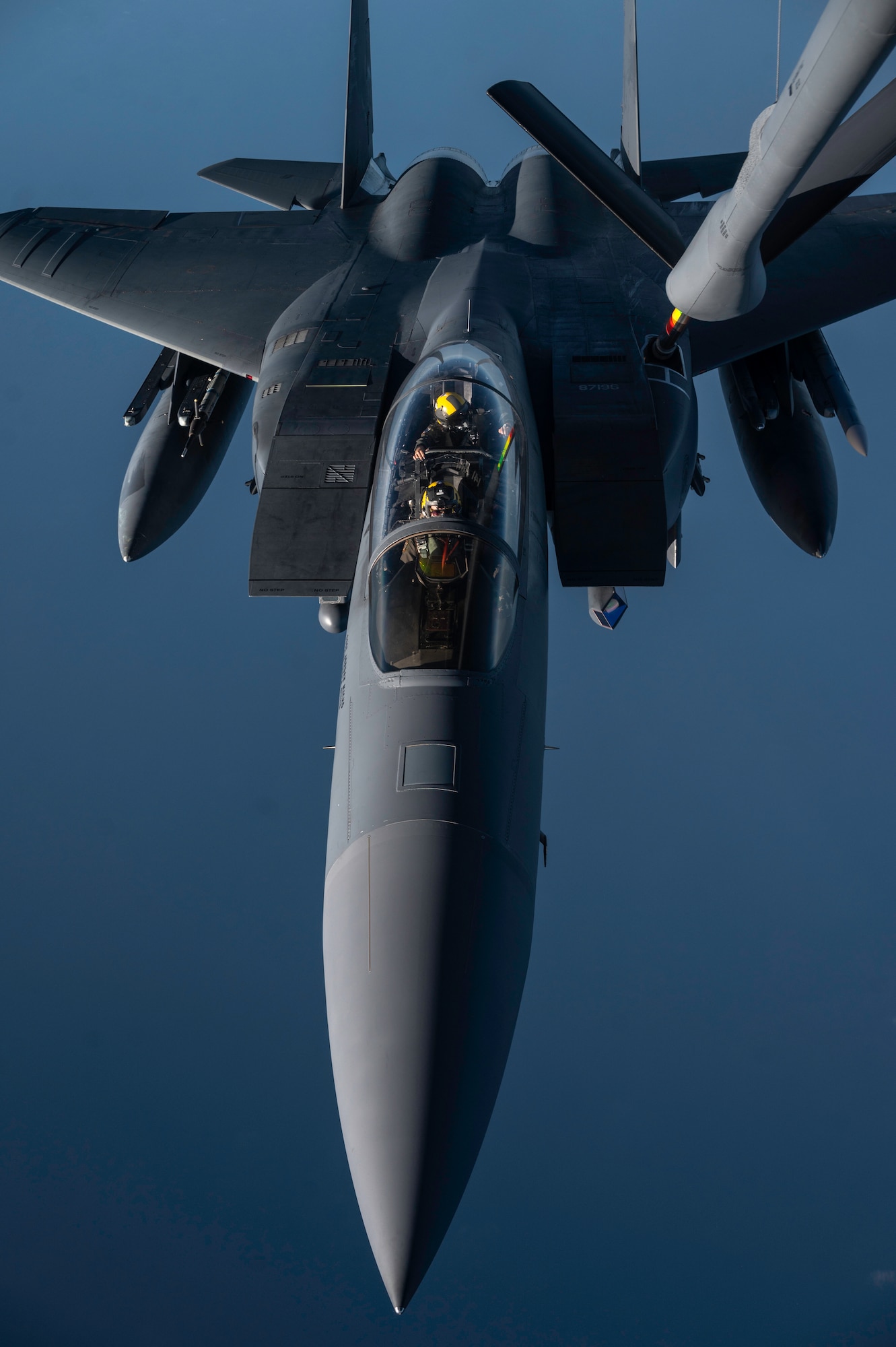 An F-15 Strike Eagle assigned to the 336th Fighter Squadron, Seymour Johnson Air Force Base, North Carolina receives fuel from a KC-135 Stratotanker assigned to the 91st Air Refueling Squadron over the Southeast Pacific Ocean during Exercise Bamboo Eagle 24-3, Aug. 7, 2024. Through employment of the KC-135 aircraft, the 91st ARS extends U.S. global power and global reach by planning and executing aerial refueling missions for U.S. and allied combat and support aircraft. During Bamboo Eagle, Air Mobility Command assets will support warfighters implementing all-domain combat-power generation from disaggregated basing locations throughout the western part of the U.S., along with distributed command and control, agile logistics, and tactical air-to-air refueling. Bamboo Eagle 24-3 is an example of how the Air Force implements large scale exercises and mission-focused training encompassing multiple operational plans to demonstrate and rehearse for complex, large-scale military operations. (U.S. Air Force photo by Tech. Sgt. Alexander Cook)