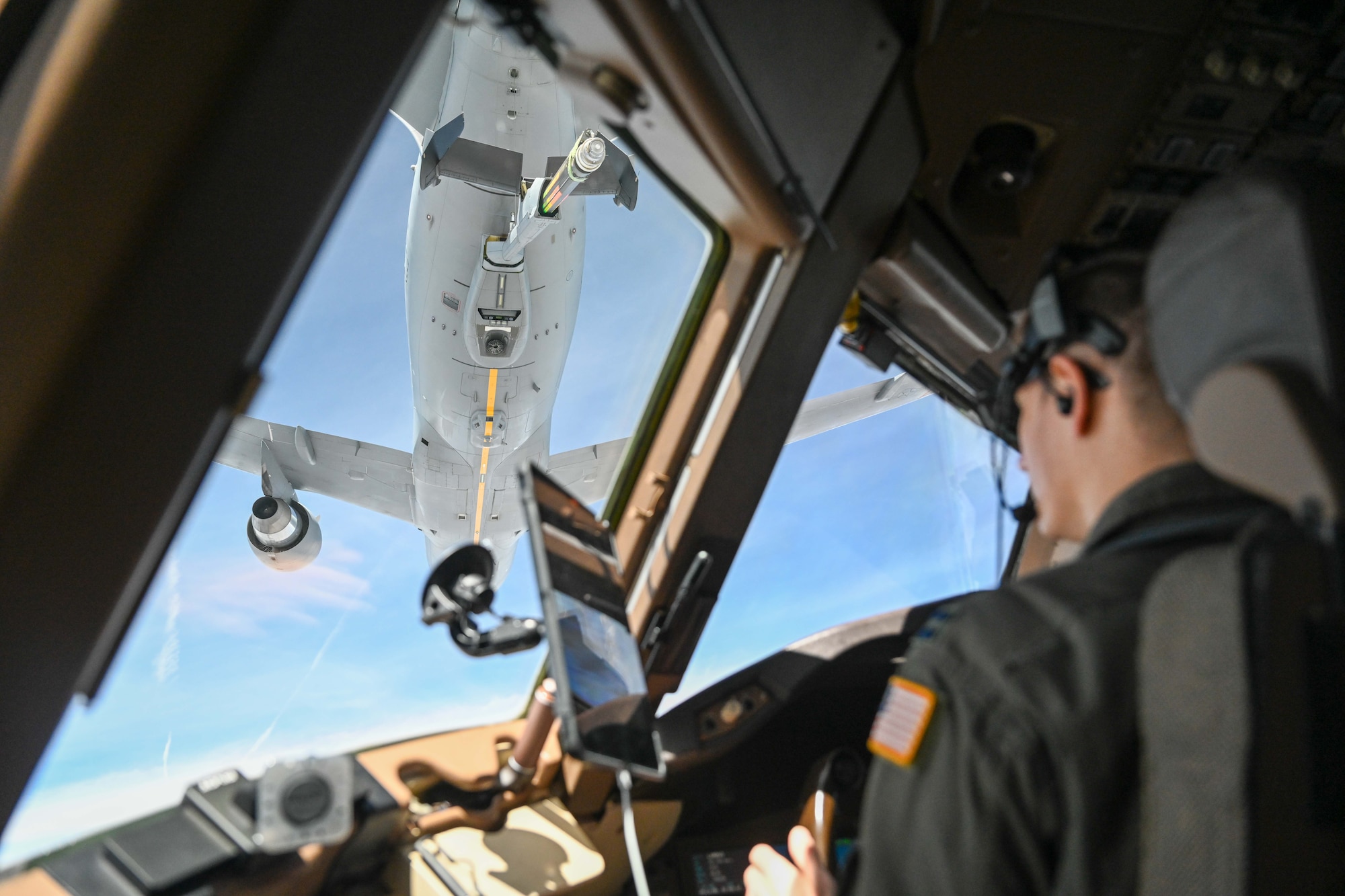 Capt. Cody Donahue, 344th Air Refueling Squadron instructor pilot, pulls up to a boom pod to be refueled as one of three KC-46 Pegasus tankers sent to support exercise Bamboo Eagle 24-3 on Aug. 2, 2024, over the coast of California. The 344th ARS provides critical inflight refueling capabilities with the Air Force’s newest tanker, testing its ability to deploy rapidly and maneuver the Joint Force at time, scale and mass. Bamboo Eagle is a coastal exercise that tests the integration of mobility, combat, bomber, joint and Allied aircraft, which is key to joint force and international partner success. This iteration’s BE 24-3 is an example of how the Air Force implements large-scale exercises and mission-focused training encompassing multiple operational plans to demonstrate and rehearse for complex, large-scale military operations.