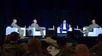 Alex Wagner, the Assistant Secretary of the Air Force for Manpower and Reserve Affairs, Chief Master Sgt. of the Air Force David Flosi and Chief Master Sgt. of the Space Force John Bentivegna speak at the Air Force Sergeants Association in Houston, Texas, Aug.13, 2024. Senior enlisted leaders gathered at the AFSA Summit to strategize, enhance innovation, and advance development for the Department of the Air Force. (U.S. Air Force photo by 2nd Lt. Faith Powers)