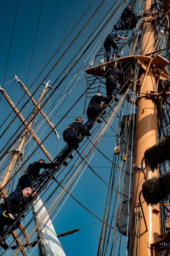 Coast Guard Academy Cadets climb the rigging of Coast Guard Cutter Eagle (WIX 327) while underway July, 30, 2024. The Eagle serves as a classroom at sea for Academy Cadets and future leaders in the Coast Guard.