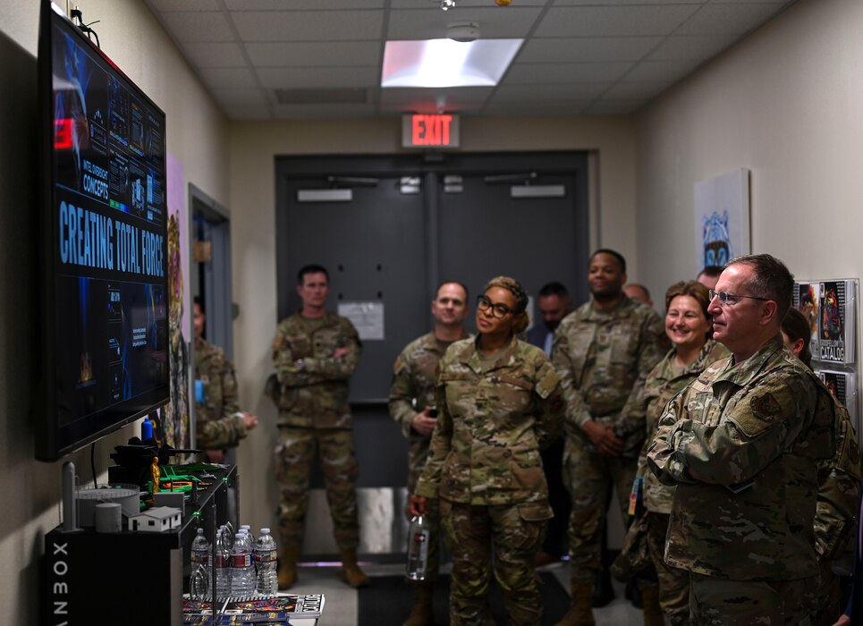 U.S. Air Force Vice Chief of Staff Gen. Jim Slife is shown programs created by the 17th Training Support Squadron’s Instructional Training Unit at Brandenburg Hall during his visit, Goodfellow Air Force Base, Texas, Aug. 14, 2023. These programs aim to keep Airmen informed and mission-ready as they transition to their operational units. (U.S. Air Force photo by Airman 1st Class Madi Collier)
