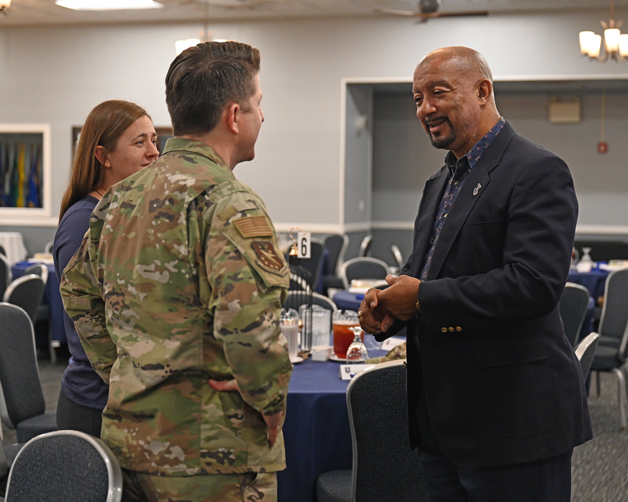 Col. James Blech, 14th Flying Training Wing commander speaks with Dr. Stan McCrary, Columbus Air Force Base Wingman, at Col. Blech’s first Base Community Council meeting on August 14, 2024, at Columbus Air Force Base, Mississippi. The BCC is an action-oriented, multi-community organization that supports the common interest of military and civilian communities through mutual understanding and joint participation in common activities. (U.S. Air Force Photo by Elizabeth Owens)