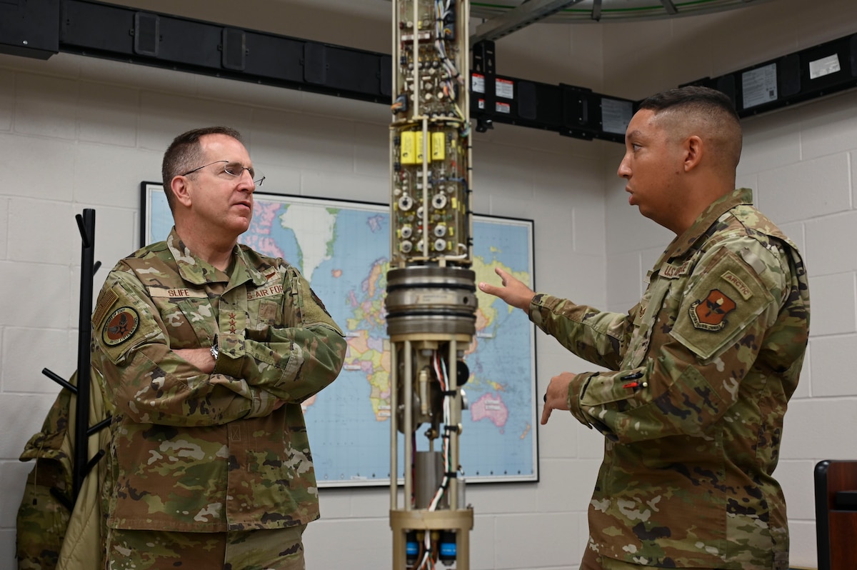 U.S. Air Force Vice Chief of Staff Gen. Jim Slife is briefed by Tech. Sgt. Robert Kerdowski, 312th Training Squadron Special Instrument Training instructor, at the Louis F. Garland Department of Defense Fire Academy during his visit, Goodfellow Air Force Base, Texas, Aug. 14, 2023. He learned how these specialists train at Goodfellow before deploying to austere locations, where they are expected to perform their duties independently functioning as multiple AFSCs to accomplish the mission. (U.S. Air Force photo by Airman 1st Class Madi Collier)
