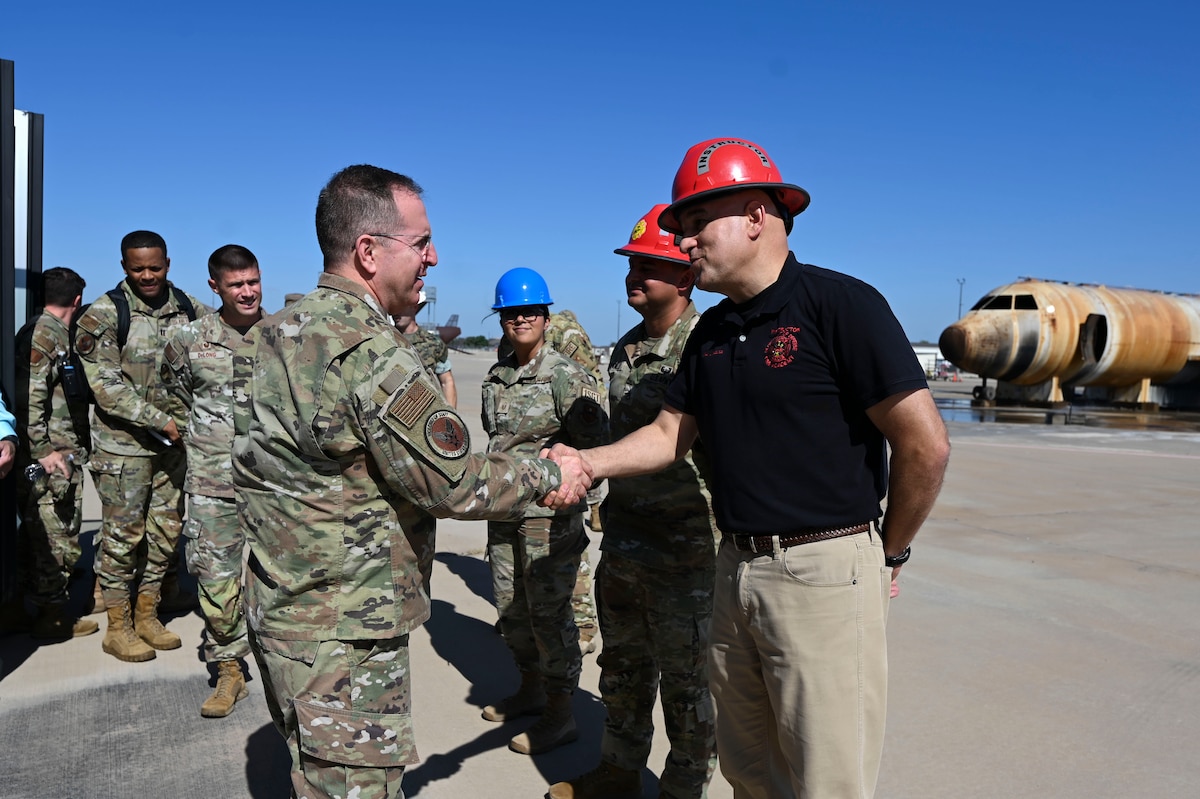 U.S. Air Force Vice Chief of Staff Gen. Jim Slife is greeted by 312th Training Squadron leadership and instructors at the Louis F. Garland Department of Defense Fire Academy during his visit, Goodfellow Air Force Base, Texas, Aug. 14, 2023. While at the 312th TRS, Slife was briefed on the current state of training and what it takes to be a fire protection specialist. (U.S. Air Force photo by Airman 1st Class Madi Collier)