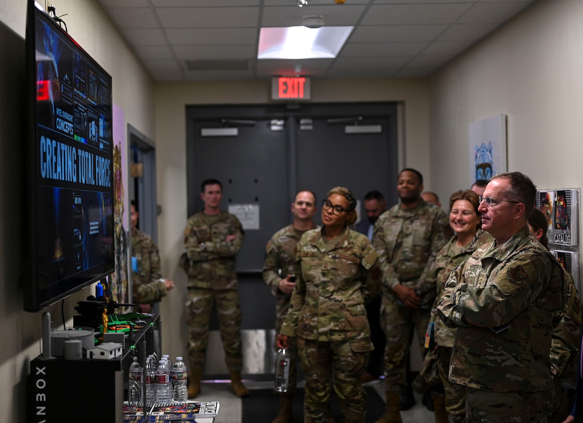 U.S. Air Force Vice Chief of Staff Gen. Jim Slife is shown programs created by the 17th Training Support Squadron’s Instructional Training Unit at Brandenburg Hall during his visit, Goodfellow Air Force Base, Texas, Aug. 14, 2023. These programs aim to keep Airmen informed and mission-ready as they transition to their operational units. (U.S. Air Force photo by Airman 1st Class Madi Collier)