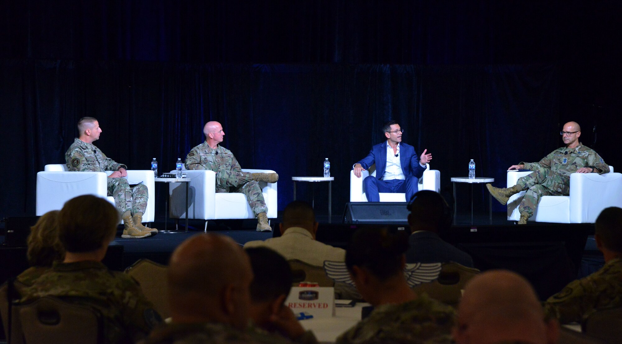 Alex Wagner, the Assistant Secretary of the Air Force for Manpower and Reserve Affairs, Chief Master Sgt. of the Air Force David Flosi and Chief Master Sgt. of the Space Force John Bentivegna speak at the Air Force Sergeants Association in Houston, Texas, Aug.13, 2024. Senior enlisted leaders gathered at the AFSA Summit to strategize, enhance innovation, and advance development for the Department of the Air Force. (U.S. Air Force photo by 2nd Lt. Faith Powers)