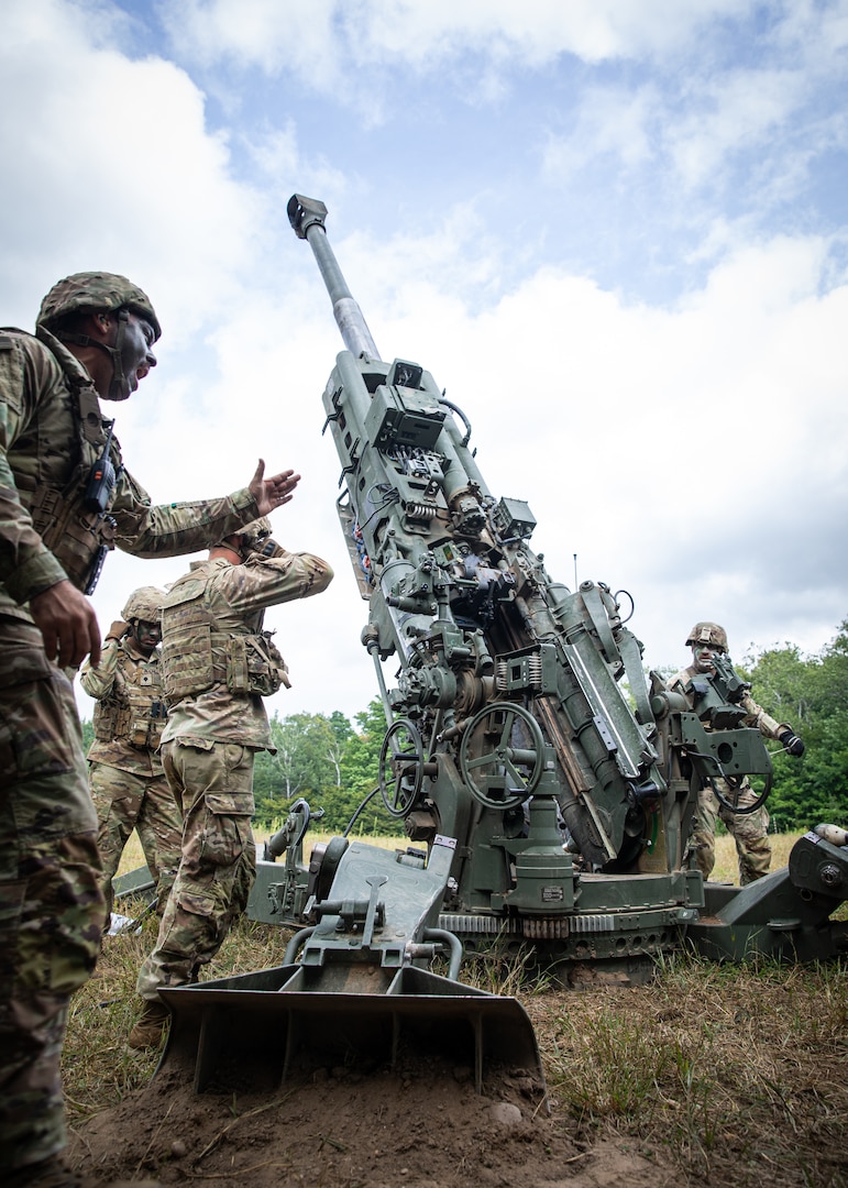 Members of Charlie Battery, 1st Battalion, 160th Field Artillery Regiment, 45th Infantry Brigade Combat Team, Oklahoma Army National Guard, fire an M777 towed 155 mm howitzer during Exercise Northern Strike 2024 at Camp Grayling, Michigan, Aug. 11, 2024. NS 24-2 is a Reserve component training event focusing on joint readiness training to build interoperability and strengthen partnerships in an all-domain environment.