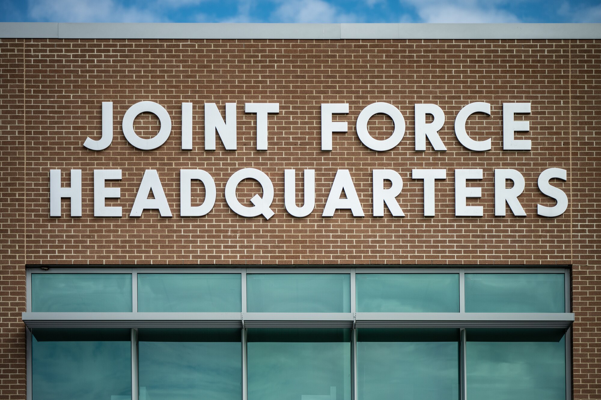 The Kentucky National Guard dedicated a new Joint Force Headquarters building during a ribbon-cutting ceremony at Boone National Guard Center in Frankfort, Ky., Aug. 13, 2024. The 63,000 square-foot, $15.9 million facility marks a new era of increased operational efficiency, with the top command elements of both the Kentucky Army and Air National Guard being located in the same site for the first time. (U.S. Air National Guard photo by Dale Greer)
