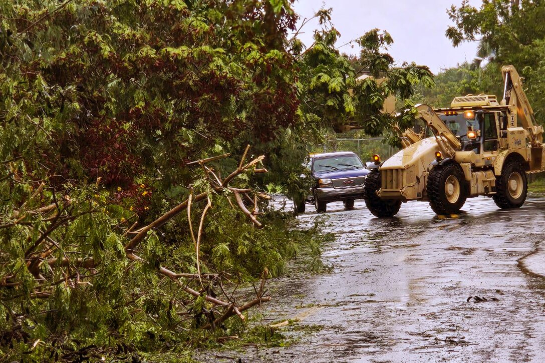 Army Reserve Soldiers from 1st Mission Support Command clear roads in Ceiba, Puerto Rico