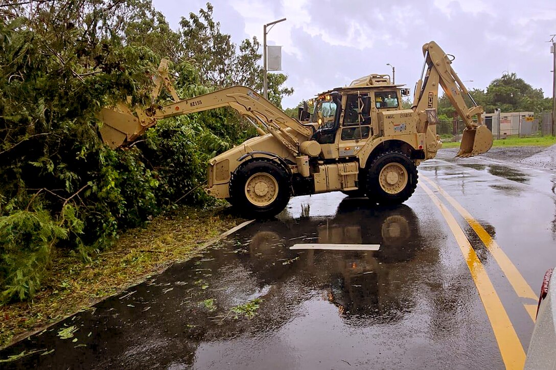 Army Reserve Soldiers from 1st Mission Support Command clear roads in Ceiba, Puerto Rico