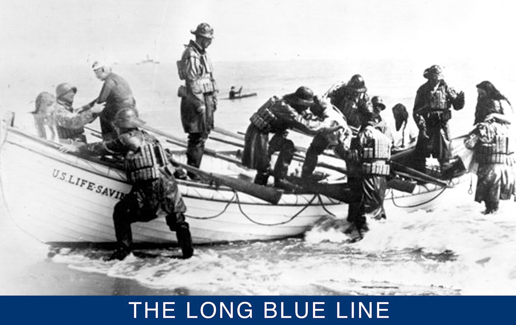 Soaked and tired, a U.S. Life-Saving Service crew lands the rescued survivors of a shipwreck. (U.S. Coast Guard)