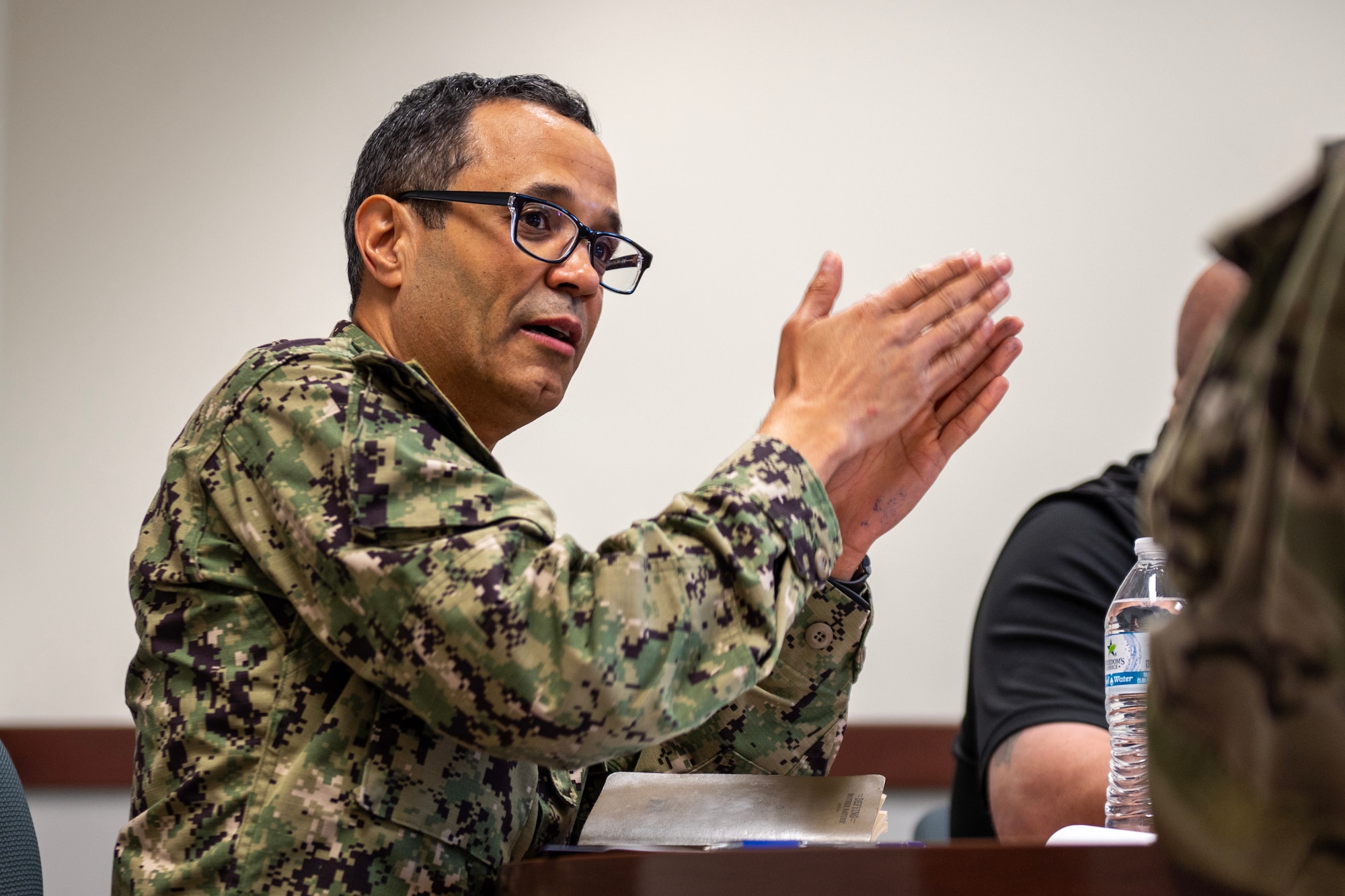 U.S. Navy Cmdr. Anas Maazouzi, Defense Logistics Agency Energy Americas West commander, attends a briefing at Fairchild Air Force Base, Washington, July 31, 2024. Airmen from the 92nd Logistics Readiness Squadron explained Fairchild AFB’s fueling mission and covered current and future projects during the brief. DLA-Energy plays a critical role in supporting the Department of Defense by ensuring a reliable supply of fuel and energy resources and managing the procurement, storage, distribution of aviation fuel, ground fuel, and other energy products necessary for the operation of aircraft and base facilities. (U.S. Air Force photo by Senior Airman Morgan St Marks)