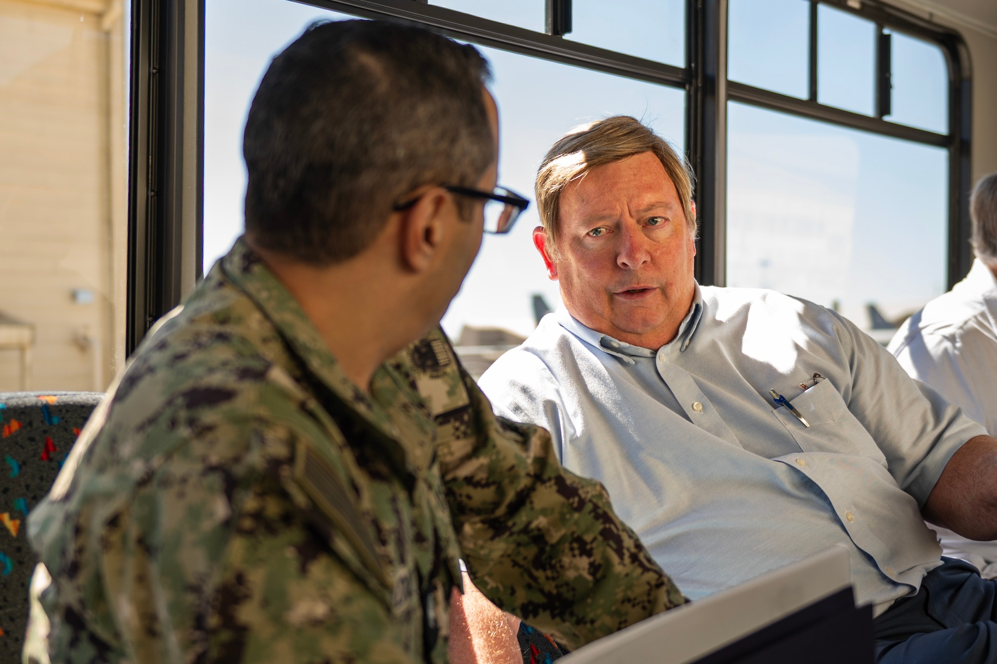 Jeffery Johnson, 92nd Mission Support Group deputy director for mission support, explains each fuel facility to U.S. Navy Cmdr. Anas E. Maazouzi, Defense Logistics Agency Energy – Americas West commander, during his visit to Fairchild Air Force Base, Washington, July 31, 2024. Maazouzi toured the Department of Defense bases and fuel supply points that he is responsible for supporting in the Pacific Northwest. DLA-E plays a critical role in supporting the DOD by ensuring a reliable supply of fuel and energy resources by managing the procurement, storage, and distribution of aviation fuel, ground fuel, and other energy products necessary for the operation of aircraft and base facilities. (U.S. Air Force photo by Senior Airman Morgan St Marks)