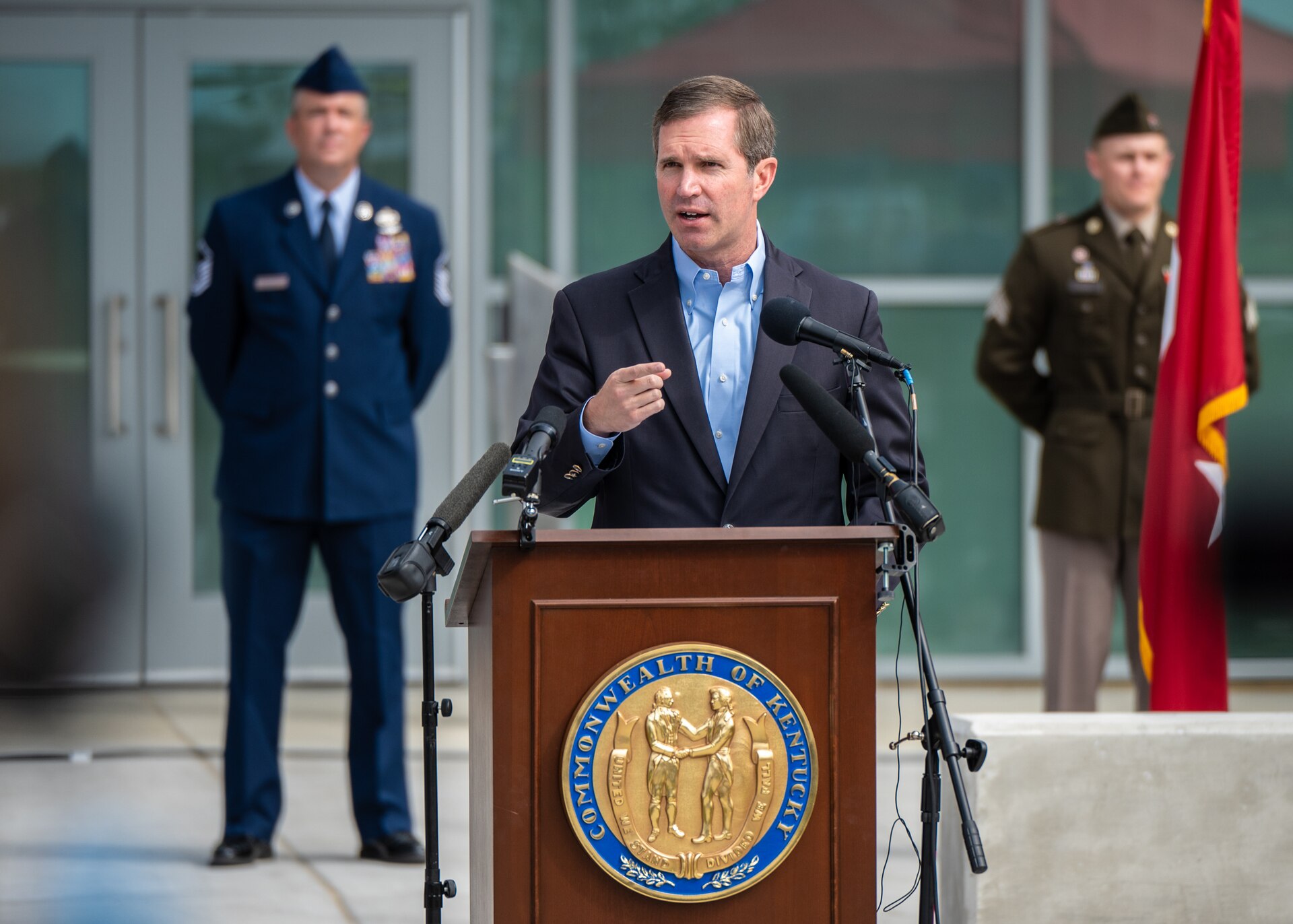 Gov. Andy Beshear addresses hundreds of Kentucky National Guard troops during the ribbon-cutting ceremony for a new Joint Force Headquarters building at Boone National Guard Center in Frankfort, Ky., Aug. 13, 2024. The 63,000 square-foot, $15.9 million facility marks a new era of increased operational efficiency, with the top command elements of both the Kentucky Army and Air National Guard being located at the same site for the first time. (U.S. Air National Guard photo by Dale Greer)