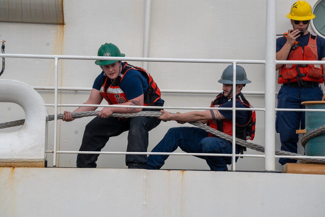 The Coast Guard Cutter Healy (WAGB 20) crewmembers conduct mooring operations upon returning to their home port at Coast Guard Base Seattle, Aug. 16, 2024. The Healy conducted a two-month Arctic patrol. (U.S. Coast Guard photo by Petty Officer 2nd Class Briana Carter)