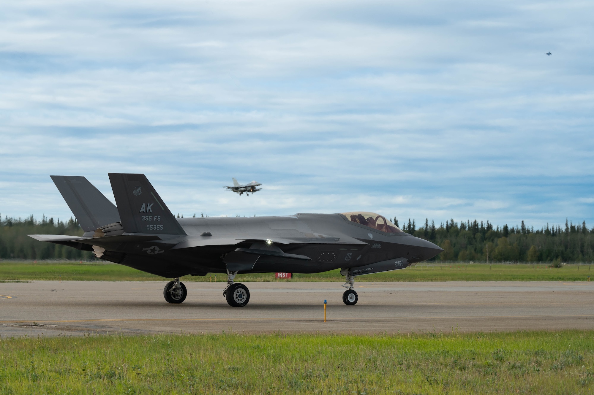 An F-35A Lightning II, assigned to the 355th Fighter Squadron, taxis on the runway before taking off during Red Flag-Alaska (RF-A) 24-3 at Eielson Air Force Base, Alaska, Aug. 14, 2024.