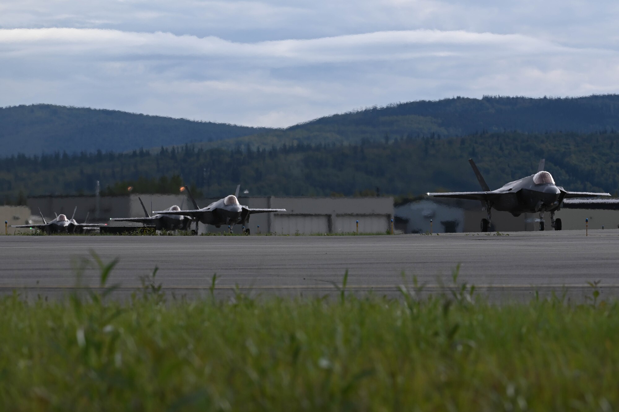 An F-35A Lightning II, assigned to the 355th Fighter Squadron, taxis on the runway before taking off during Red Flag-Alaska (RF-A) 24-3 at Eielson Air Force Base, Alaska, Aug. 14, 2024.