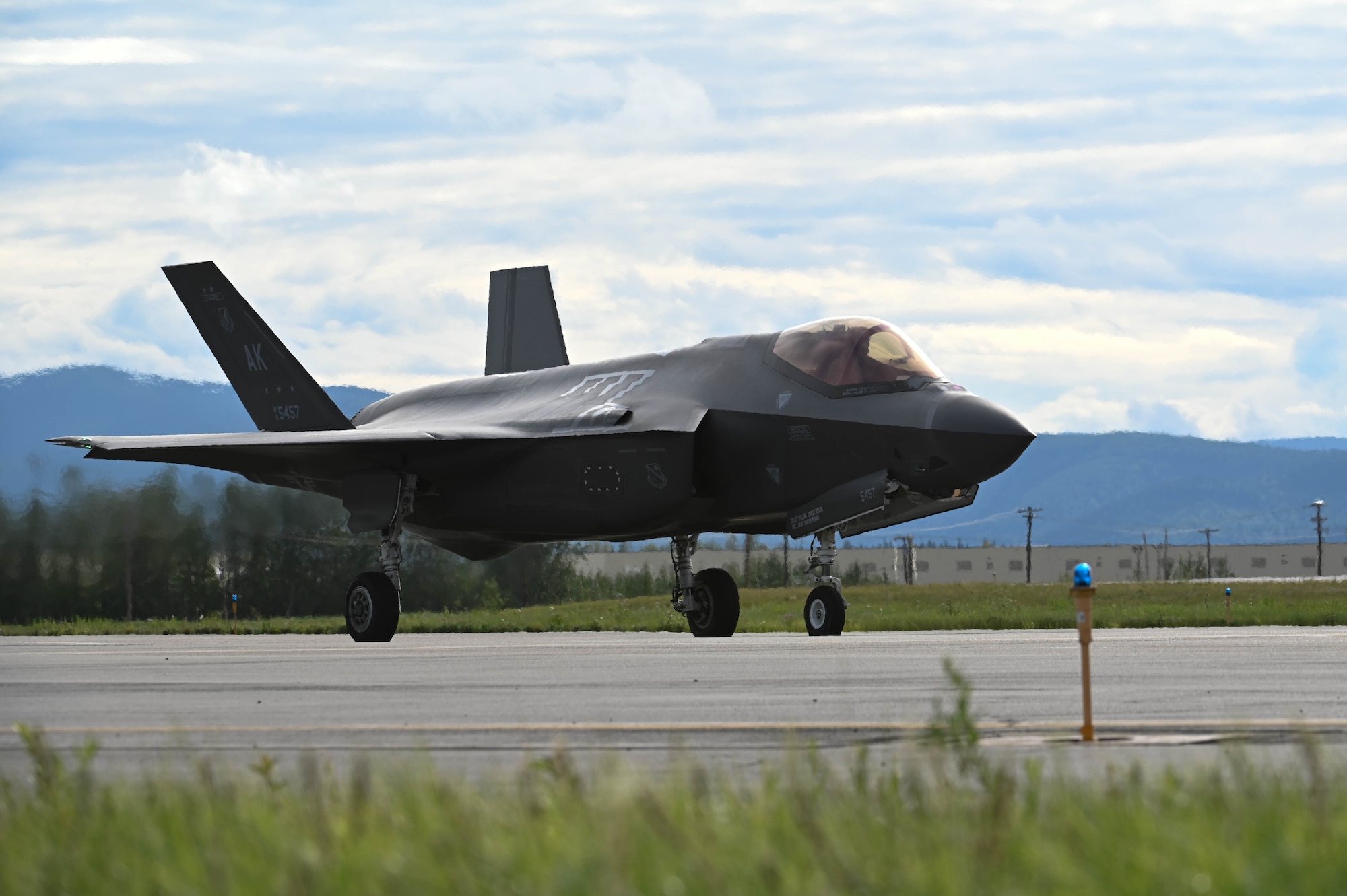 An F-35A Lightning II, assigned to the 355th Fighter Squadron, taxis on the runway before taking off during Red Flag-Alaska (RF-A) 24-3 at Eielson Air Force Base, Alaska, Aug. 14, 2024.
