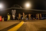 U.S. Air Force Airmen execute post flight procedures on a B-2 Spirit stealth bomber at Royal Australian Air Force Base Amberley, Australia, August 16, 2024. The United States’ commitment to the Indo-Pacific region and our partners and allies is ironclad. (U.S. Air National Guard photo by Staff Sgt. Whitney Erhart)