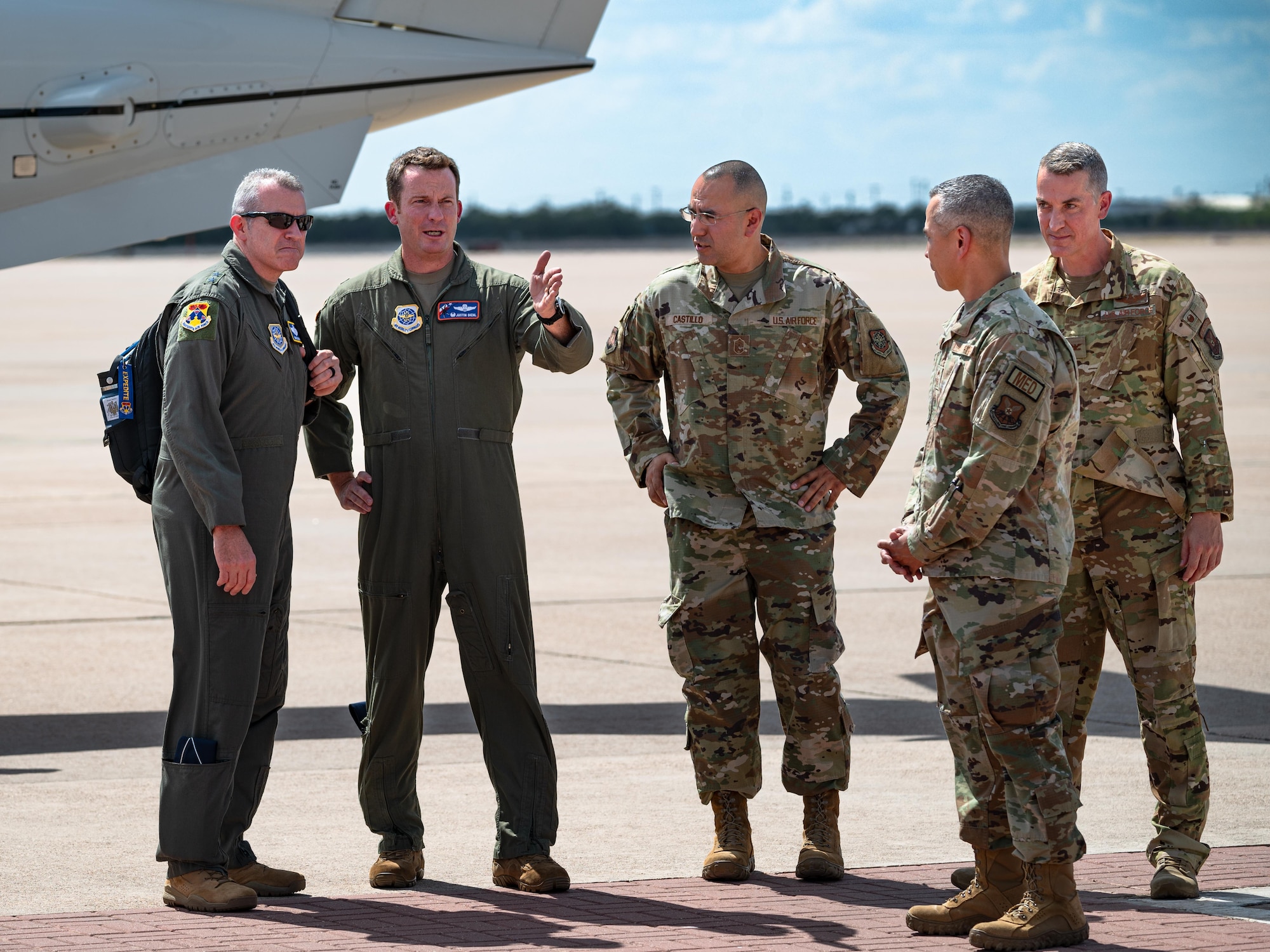 U.S. Air Force Maj. Gen. Charles Bolton, 18th Air Force commander, meets with 317th  Airlift Wing and the 7th Bomb Wing leadership on the flightline at Dyess Air Force Base, Texas, on Aug. 13, 2024. (U.S. Air Force photo by Airman 1st Class Jade M. Caldwell)