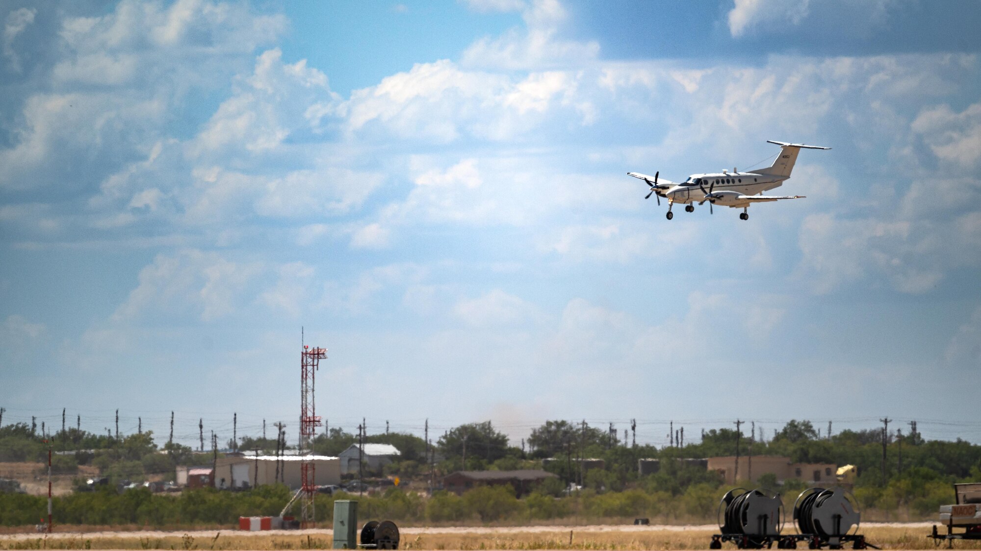 U.S. Air Force Maj. Gen. Charles Bolton, 18th Air Force commander, arrives at Dyess Air Force Base, Texas, via a C-12 Huron on Aug. 13, 2024. Bolton took command of 18th AF on Aug. 9, 2024, and is now visiting several bases to EXPEDITE Air Mobility Command’s mission of Rapid Global Mobility. (U.S. Air Force photo by Airman 1st Class Jade M. Caldwell)