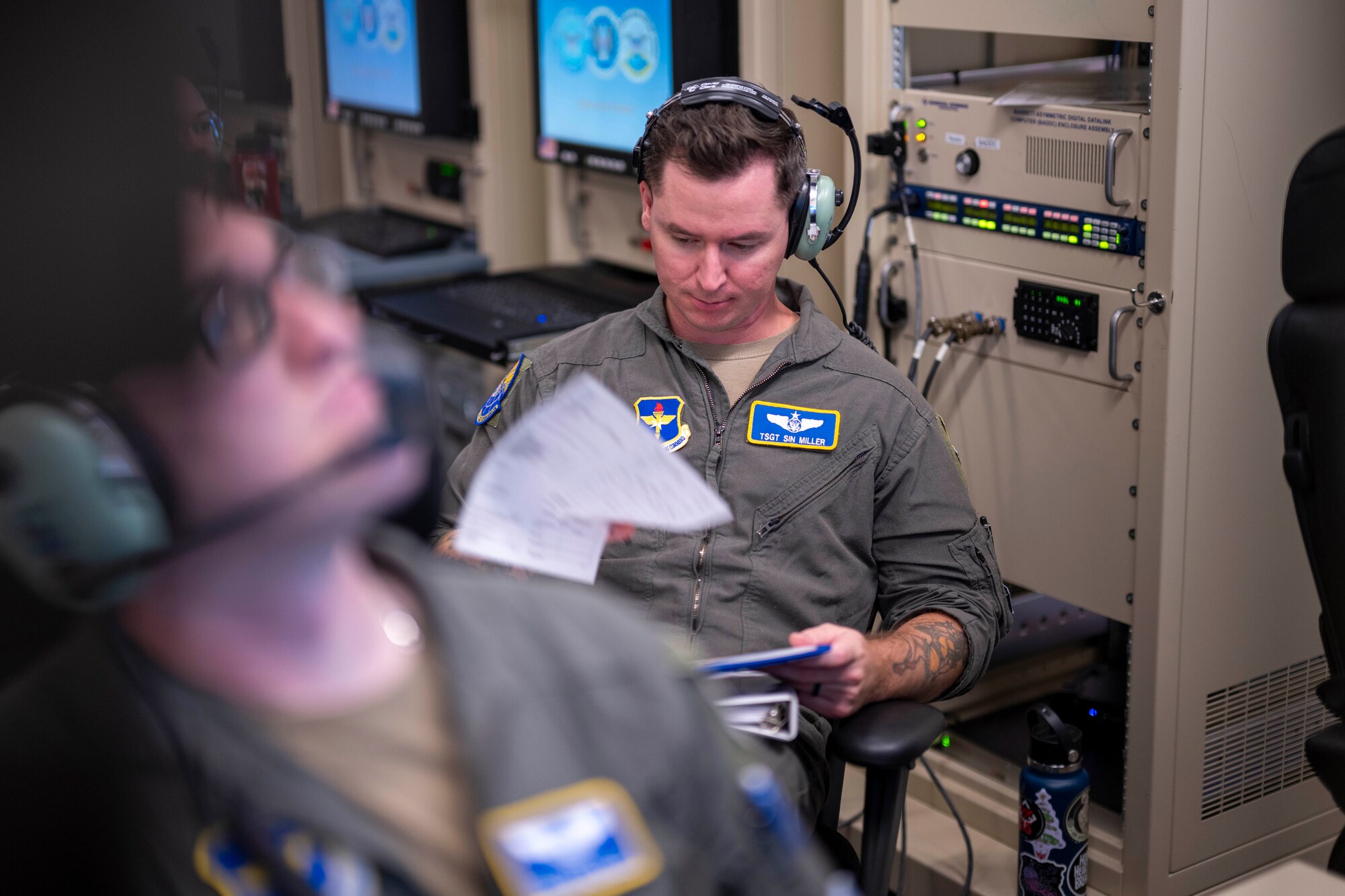 U.S. Air Force Tech. Sgt. Jacob Miller, 491st Attack Squadron MQ-9 Reaper sensor operator evaluator, oversees the flight of an MQ-9 at Hancock Field Air National Guard Base, New York, Aug. 12, 2024.