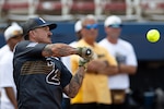 Navy Chief Nick Ludwig hits the ball during the  home run derby competition at the start of the 2024 Armed Forces Men’s and Women’s Softball Championship hosted by USA Softball at the USA Softball National Hall of Fame Complex in Oklahoma City Aug 13, 2024. The 2024 Armed Forces Men’s and Women’s Softball Championship hosted by USA Softball at the USA Softball National Hall of Fame Complex from 13-19 August features Service members from the Army, Marine Corps, Navy, Air Force (with Space Force personnel) and Coast Guard.  Teams will battle it out for gold. (DoD photo by EJ Hersom)