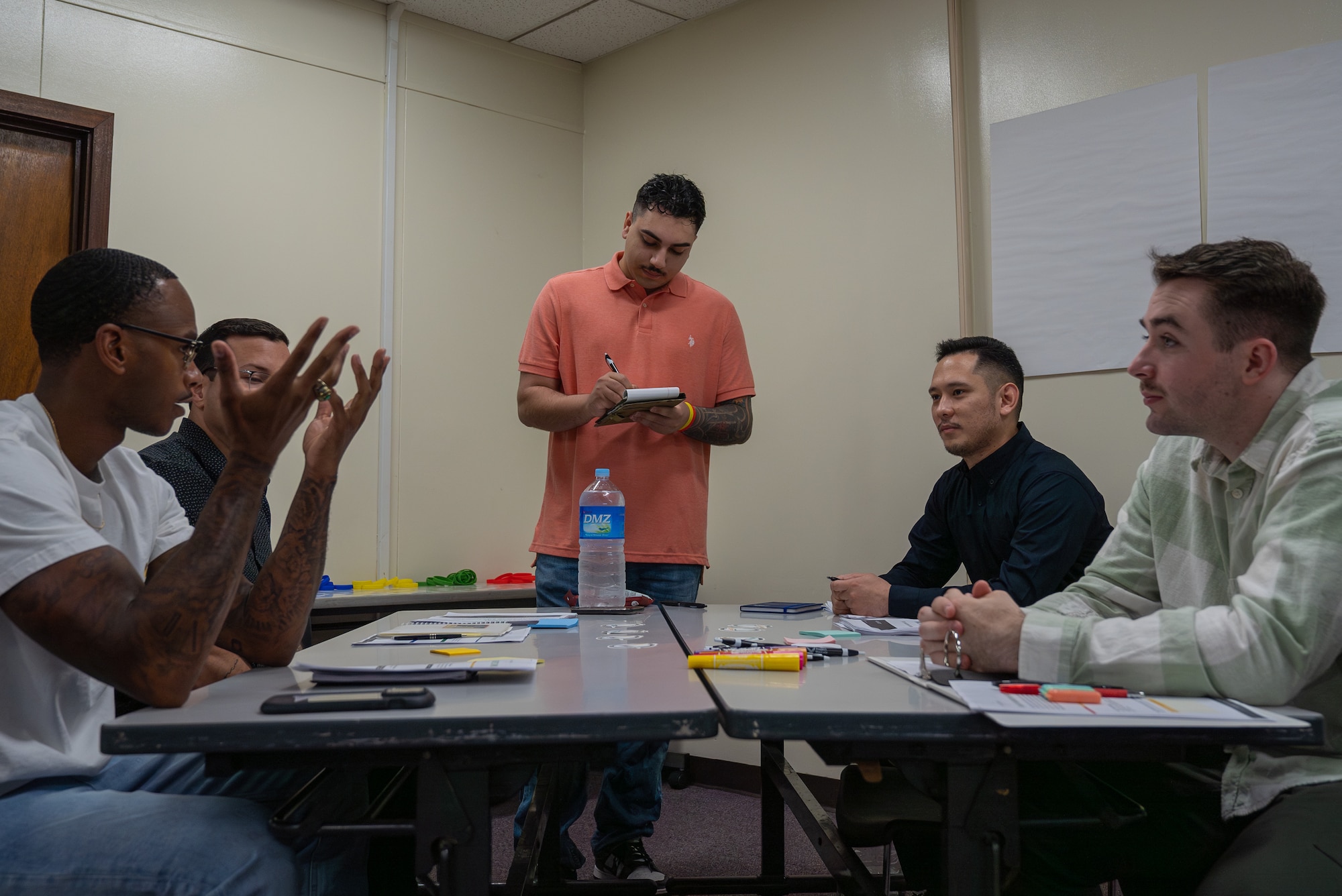 U.S. service members sharing ideas during Project Mercury workshop