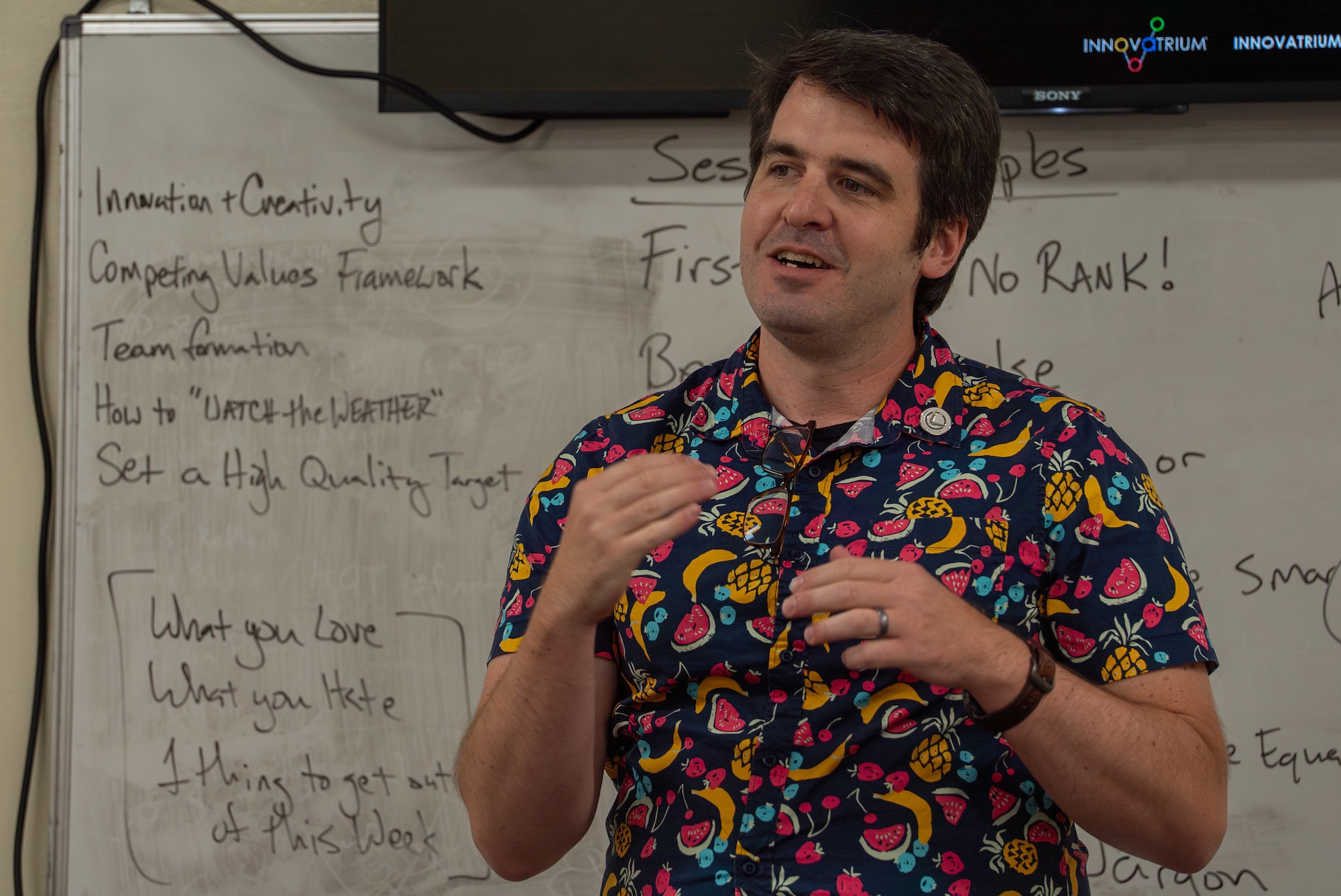 Project Mercury head instructor teaching attending U.S. service members during the workshop