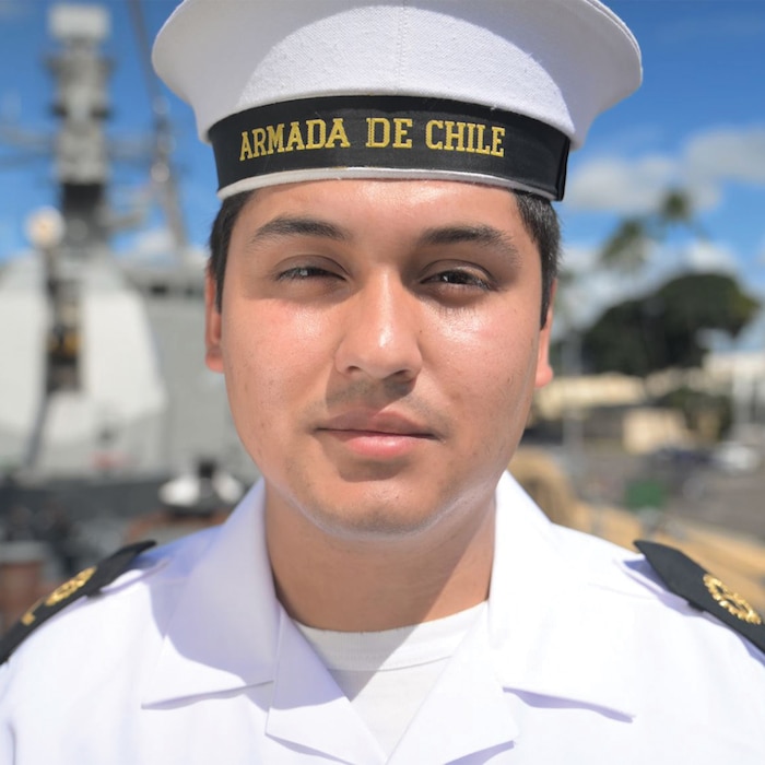 Corporal Second Class Ricardo Osorio, from the Chilean Navy, discusses his experience during Exercise Rim of the Pacific (RIMPAC) 2024. Twenty-nine nations, 40 surface ships, three submarines, 14 national land forces, more than 150 aircraft, and 25,000 personnel are participating in RIMPAC in and around the Hawaiian Islands, June 27 to Aug. 1. The world's largest international maritime exercise, RIMPAC provides a unique training opportunity while fostering and sustaining cooperative relationships among participants critical to ensuring the safety of the sea lanes and security on the world's oceans. RIMPAC 2024 is the 29th exercise in the series that began in 1971. (U.S. Navy video by Kashif Basharat)