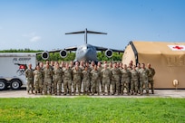 U.S. Airmen assigned to the 125th Medical Group, Detachment 1, stand for a group photo during an exercise Aug. 9, 2024, at Muñiz Air National Guard Base, Carolina, Puerto Rico.