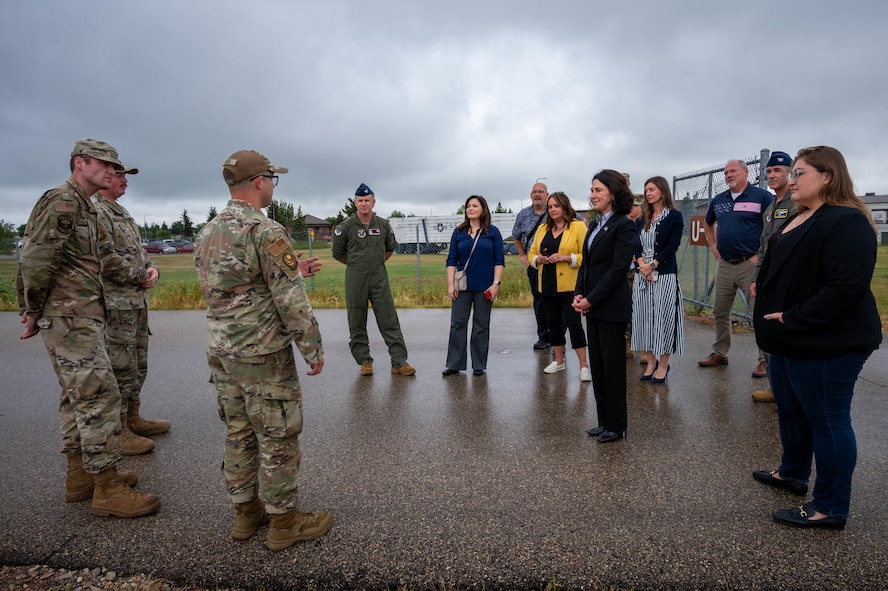 Instructors from the 373rd Training Squadron Detachment 23 greet North Dakota Lt. Gov. Tammy Miller and other members of the party touring at Minot Air Force Base, North Dakota, Aug. 15, 2024. The tour encapsulated the Minot AFB mission and its importance as the only dual-wing nuclear capable base in the Air Force. (U.S. Air Force photo by Senior Airmen Alexander Nottingham)