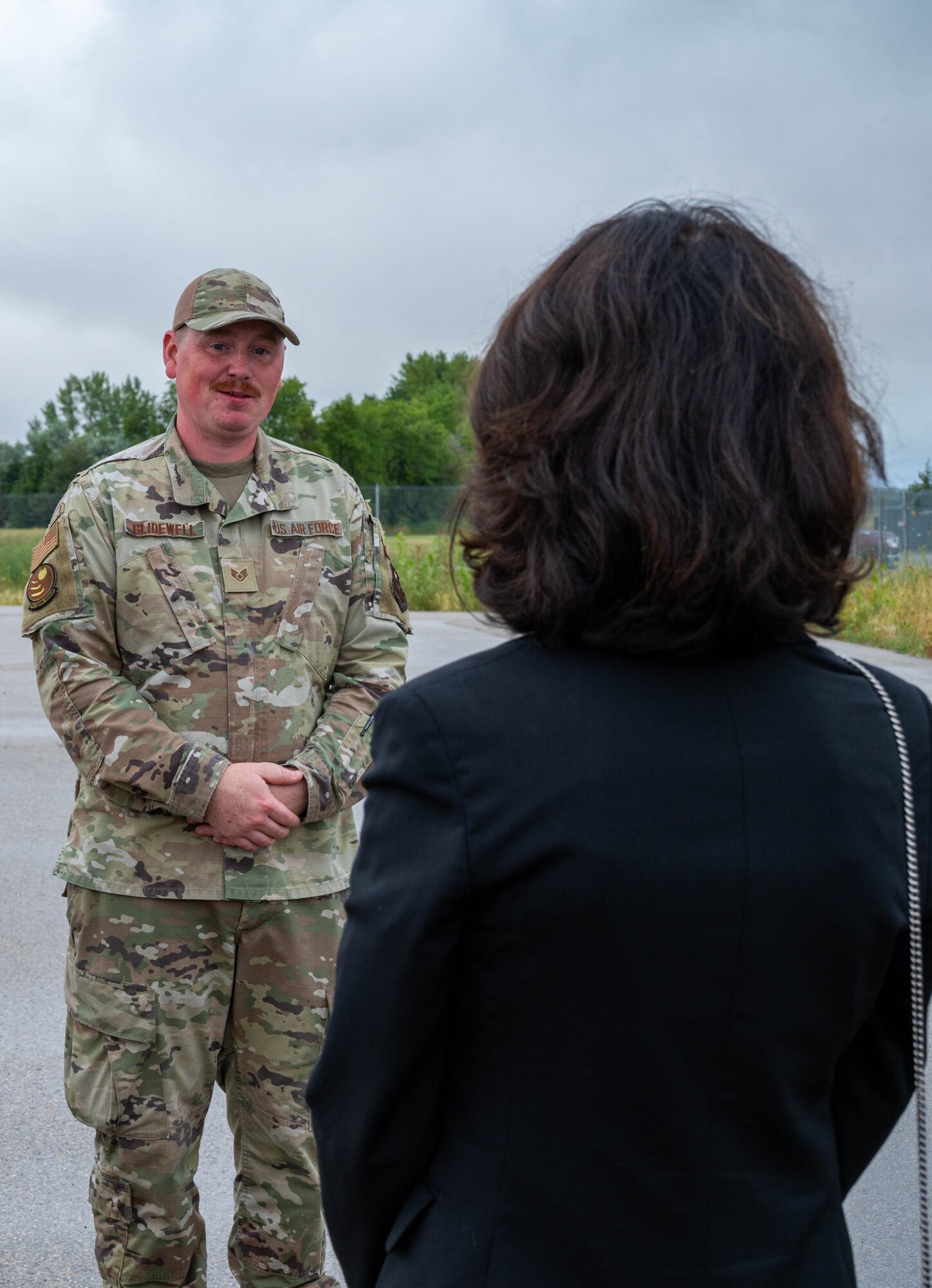 U.S. Air Force Staff Sgt. Coy Glidewell, 373rd Training Squadron, Detachment 23 instructor, explains Minute Man III intercontinental ballistic missile maintenance to North Dakota Lt. Gov. Tammy Miller at Minot Air Force Base, North Dakota, Aug. 15, 2024. Miller was briefed on how Minot Missile Maintenance teams are responsible for maintaining a fleet of 150 Minuteman III missiles. (U.S. Air Force photo by Senior Airmen Alexander Nottingham)