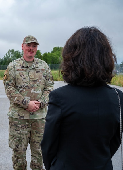 U.S. Air Force Staff Sgt. Coy Glidewell, 373rd Training Squadron, Detachment 23 instructor, explains Minute Man III intercontinental ballistic missile maintenance to North Dakota Lt. Gov. Tammy Miller at Minot Air Force Base, North Dakota, Aug. 15, 2024. Miller was briefed on how Minot Missile Maintenance teams are responsible for maintaining a fleet of 150 Minuteman III missiles. (U.S. Air Force photo by Senior Airmen Alexander Nottingham)