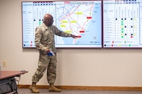 U.S. Army Chief Warrant Officer 3 Preston Robinson, with the Joint Staff - Joint Force Headquarters, New Jersey National Guard, briefs staff during training exercise Vigilant Guard in Lawrenceville, New Jersey, Aug. 18, 2024. Vigilant Guard is a full-scale exercise to ensure effective coordination between local, state, private sector, non-governmental and federal partners.