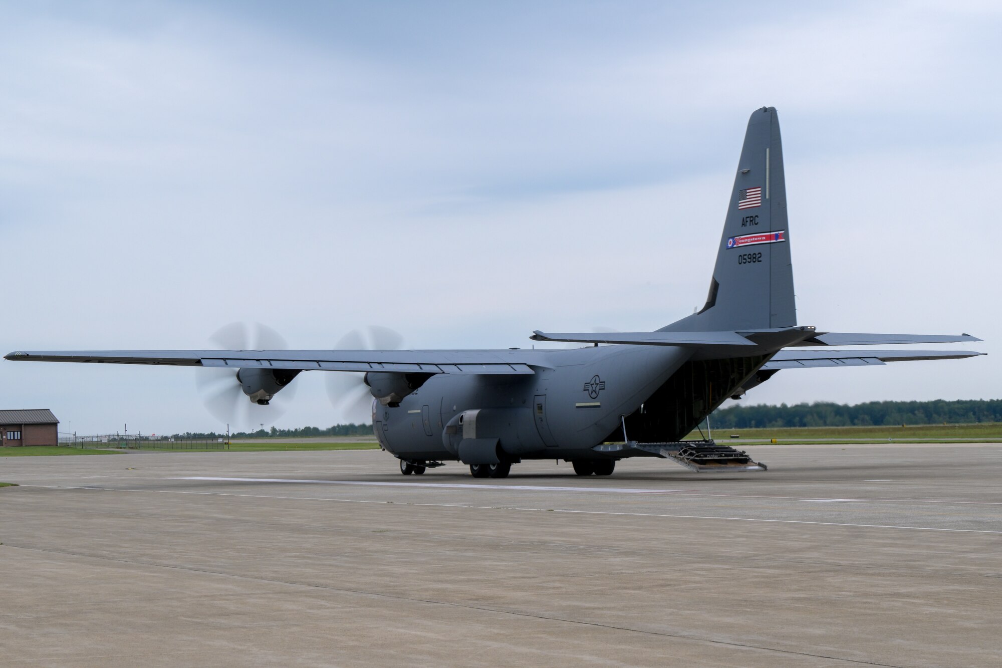 A C-130J Super Hercules aircraft performs a tactical cargo offload at Youngstown Air Reserve Station, Ohio, Aug. 16, 2024, after its maiden flight as the 910th Airlift Wing's newest aircraft.