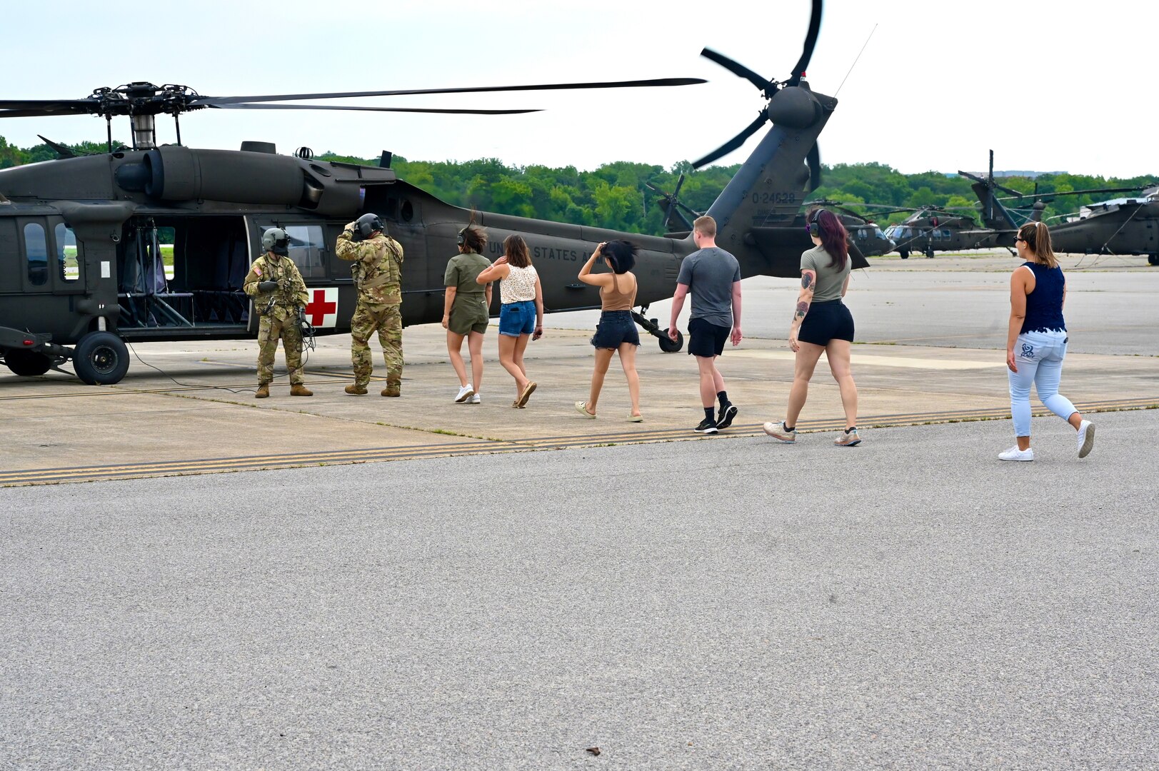 The District of Columbia Army Aviation Command provides spouse orientation flights during family day at Davison Army Airfield, Fort Belvoir, Va., on August 11, 2024. In addition to a capabilities brief presented by the State Aviation Officer and senior leaders, spouses and family members learned more about DCARNG assets to include rotary-wing and fixed-wing operational support airlifts, medical evacuation capabilities, and interagency partnerships.